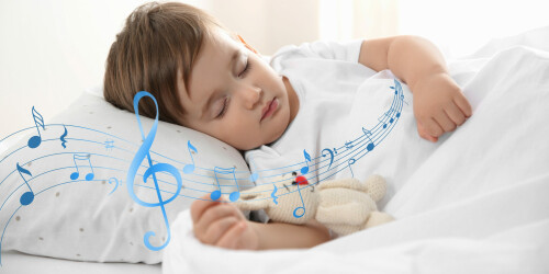 cute-little-baby-sleeping-with-toy-at-home-lullaby-songs-and-music
